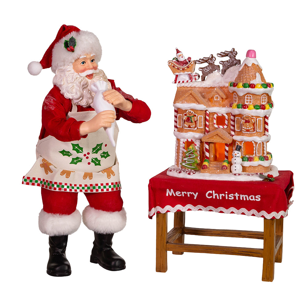 10.5" Fabriché™ Battery-Operated Santa with Gingerbread Houses – 2-Piece Holiday Set