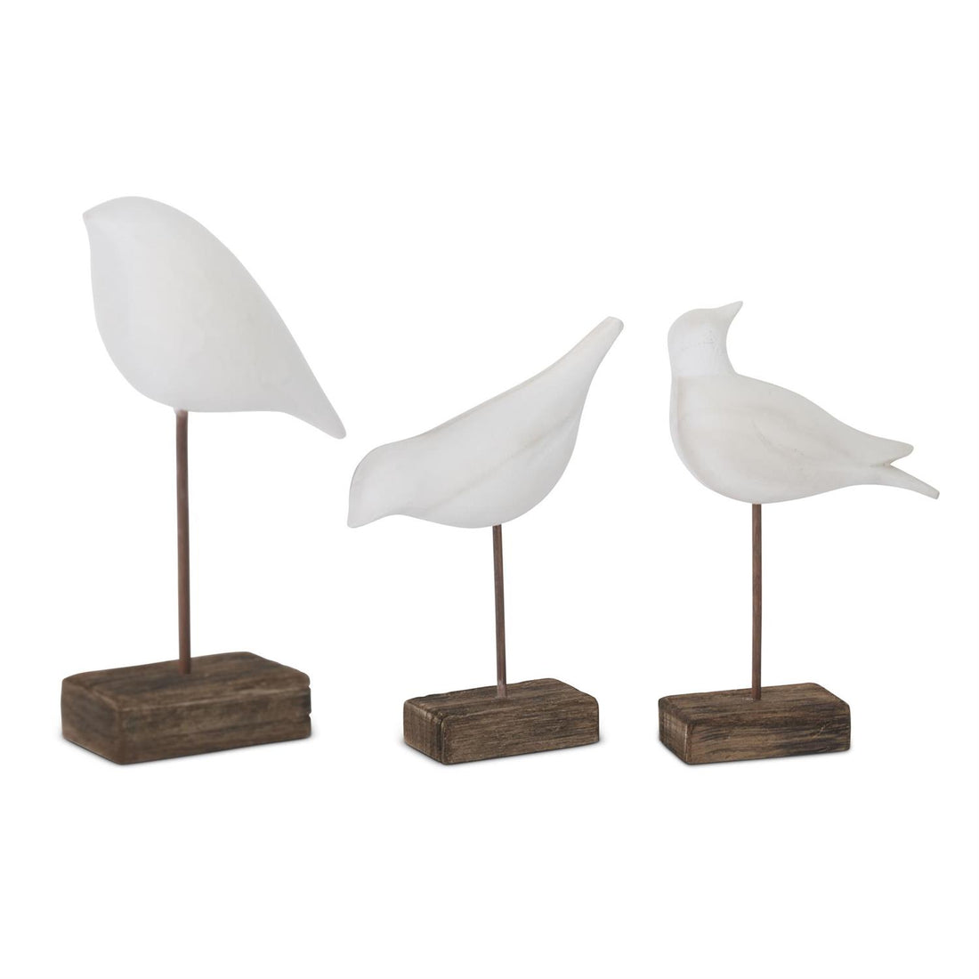 Set of three white wood shore bird figurines on spindle stands