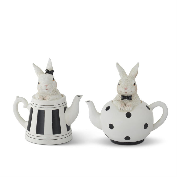 Set of two white resin bunny figurines in black-and-white teapots