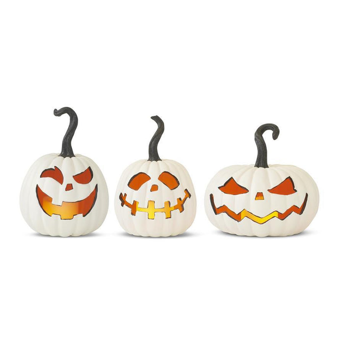 set of three LED lighted white jack-o'-lantern pumpkins with timers