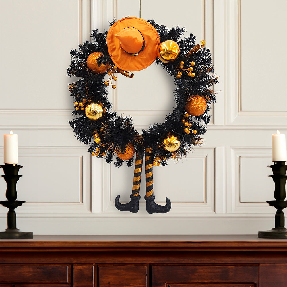 Black witch-themed Halloween wreath for door or wall display