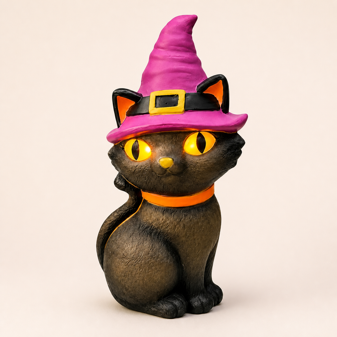 LED black cat blow mold with magenta witch hat on a neutral catalog background