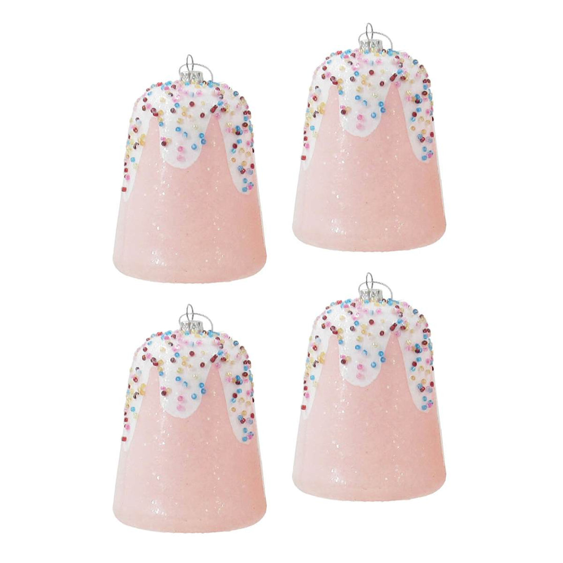 Set of four pink gumdrop Christmas ornaments with white icing and colorful sprinkles on white
